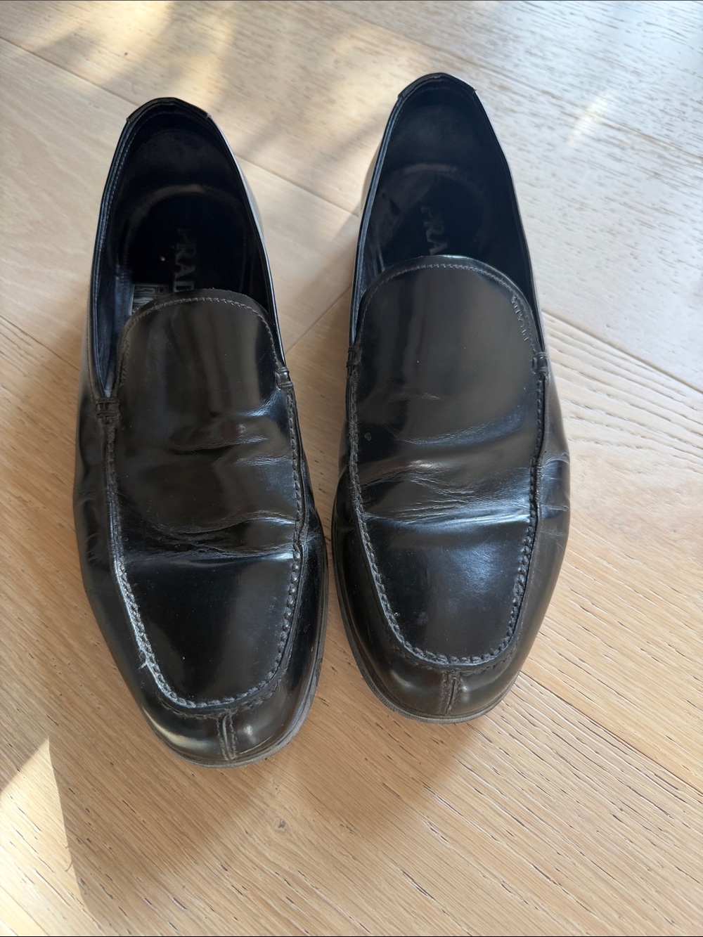 Prada Black Leather Slip-On Loafers